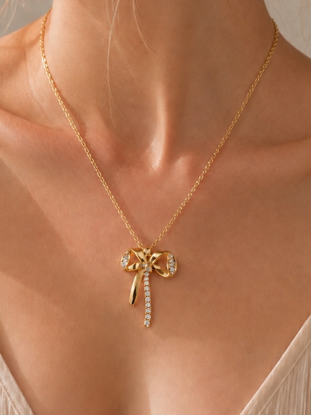 #219 Gold Plated Stainless Steel CZ Bow Necklace